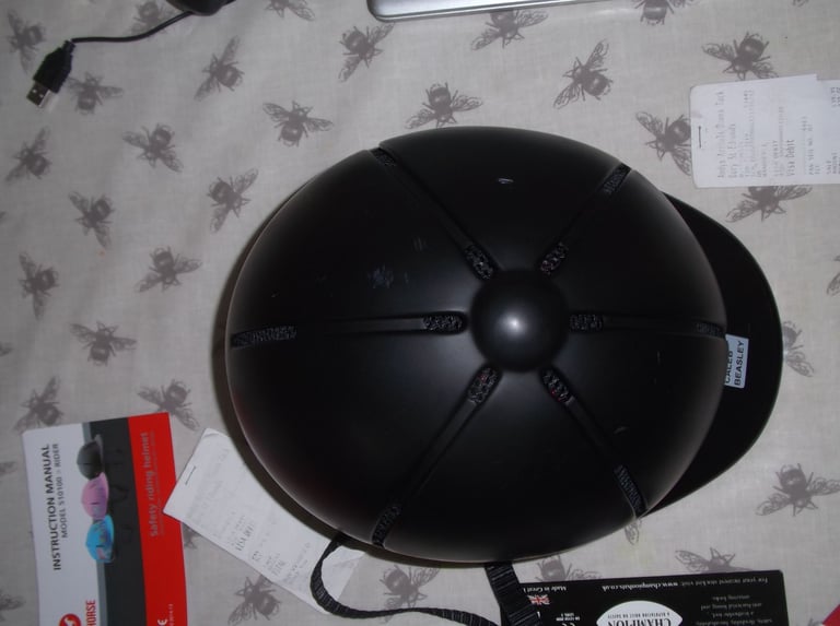 Childs horse riding safety helmet and storage bag