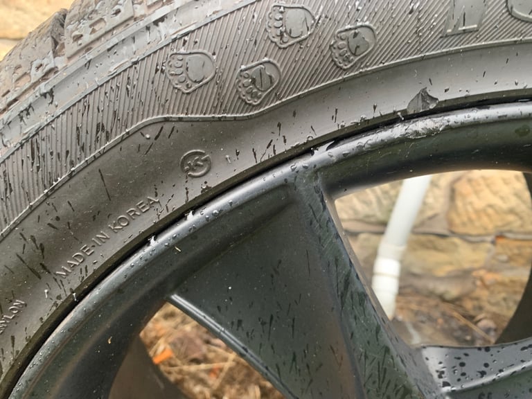 4 Black alloys with winter tyres for BMW X6 or similar