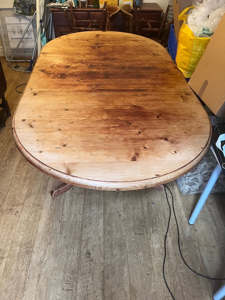 Large extendable solid wood dining table and 8 chairs