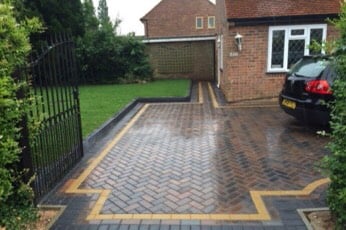 Block paving Indian stone flags tarmac turf fence 