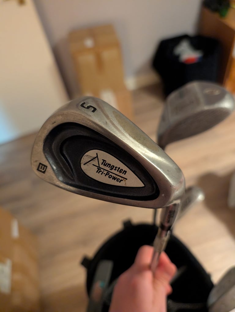 image for golf clubs, bag, balls