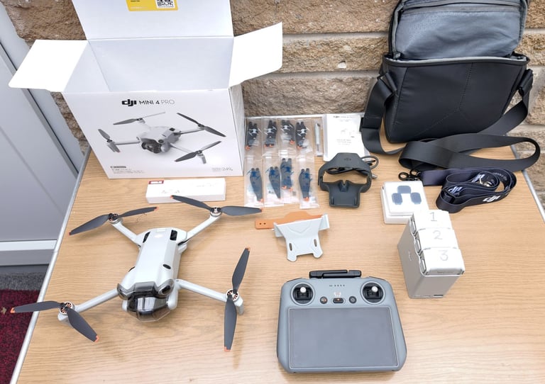DJI Mini 4 Pro Fly More Combo With RC2 Controller + 18 months DJI Warranty
