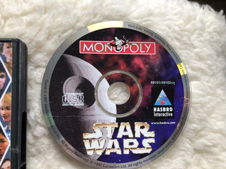 10 PC GAMES & PES2015 & 6 kids DVDs; Sims3,Monopoly,Tomb Raider,Football Manager, Star Wars