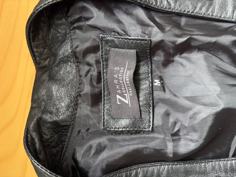 LEATHER WAISTCOAT WITH BADGES