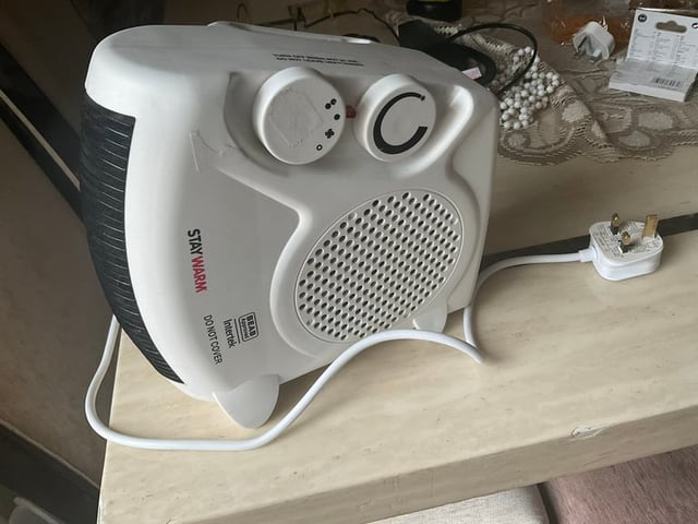 https://www.gumtree.com/p/heating-fireplaces/used-staywarm-2000w-upright-flatbed-fan-heater-good-working-%C2%A38/1467338663