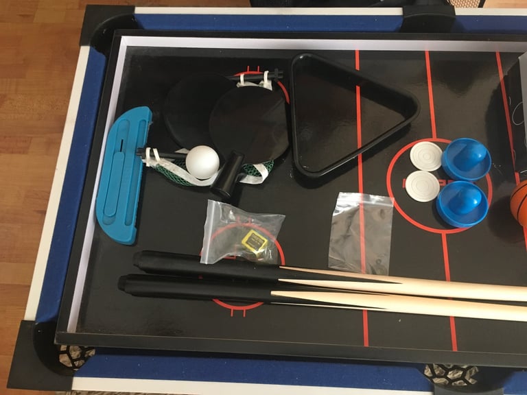 Four in one games table. Snooker,table tennis, air hockey and basketball.