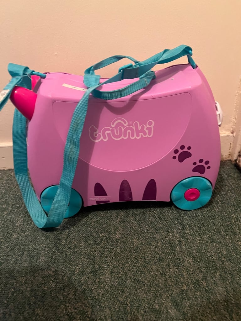 Used kids Purple Trunki Ride on 