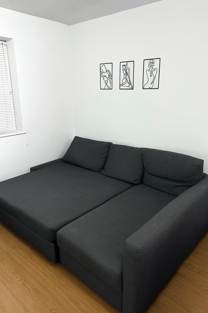 IKEA Grey L-Shaped Sofa Bed with storage