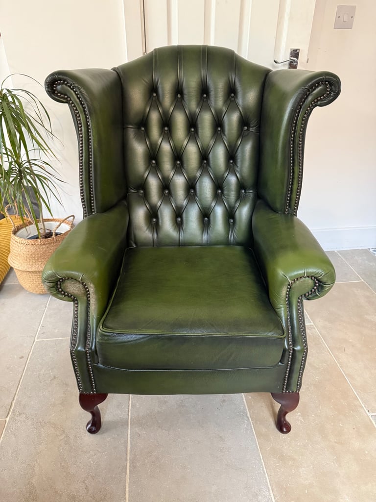 Green leather Chesterfield armchair 
