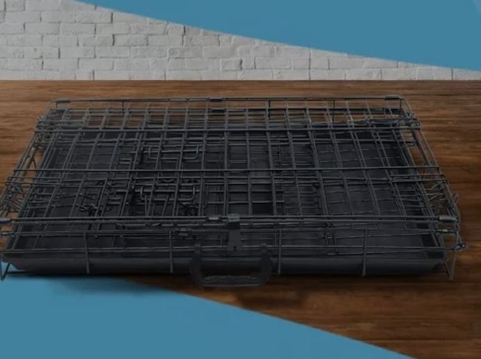 A new still boxed 30inch Heavy Duty Dog Crate Black Metal Folding Cage .