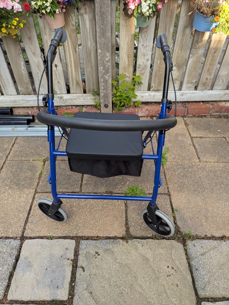 Four wheeled mobility walker
