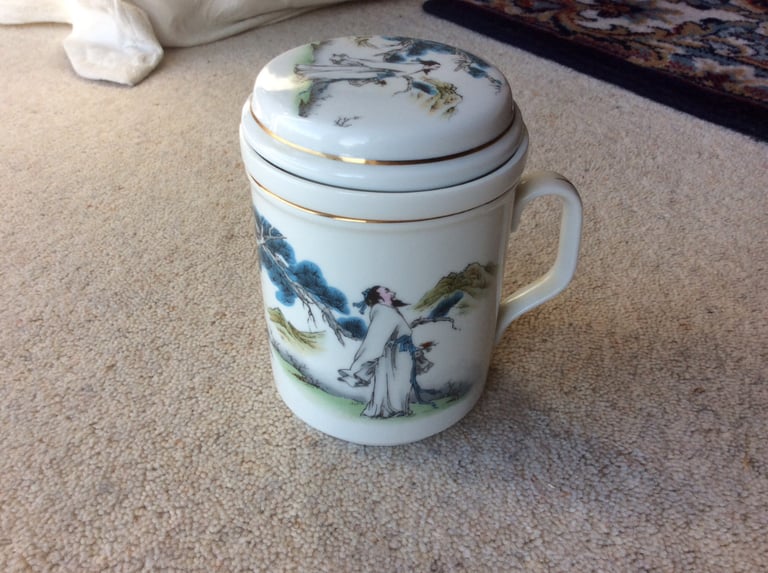 Japanese tea mug with infuser.