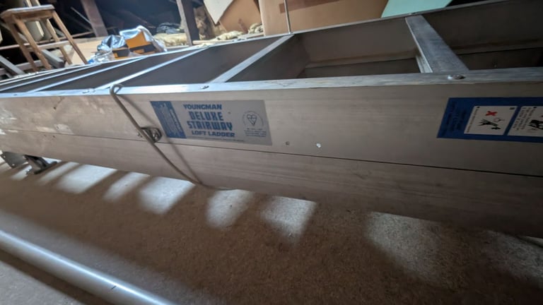 Used Youngman deluxe loft ladder with rails