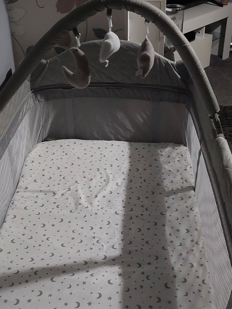 Brand new travel cot