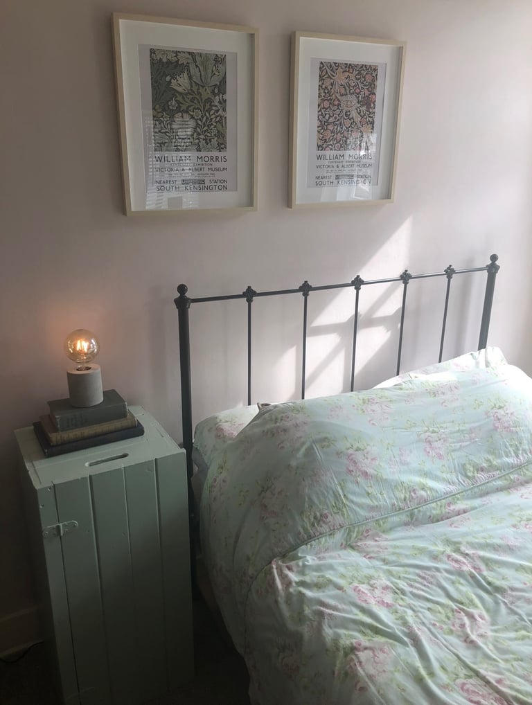 Elegant iron bed frame in vintage style 