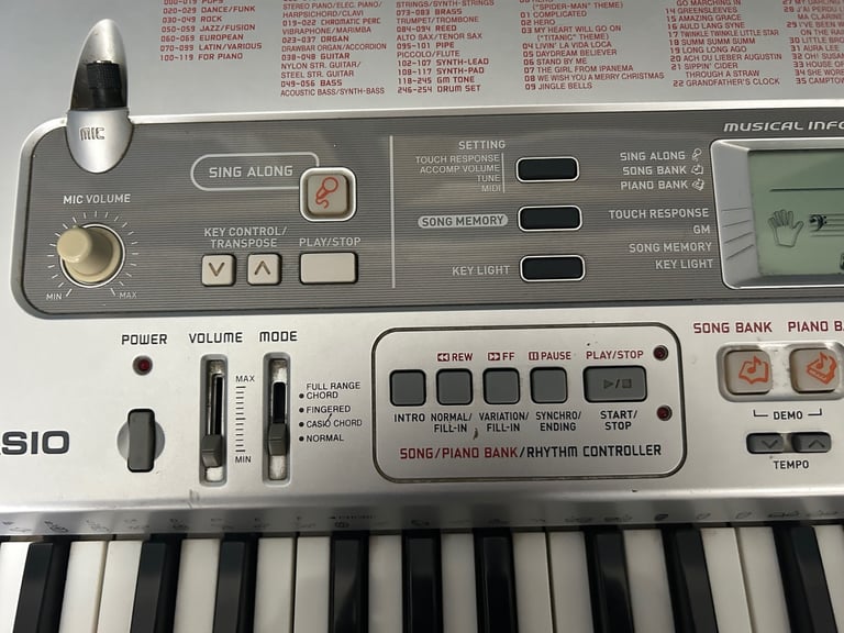 Casio Keyboard and Stand, with Learn to Play Function