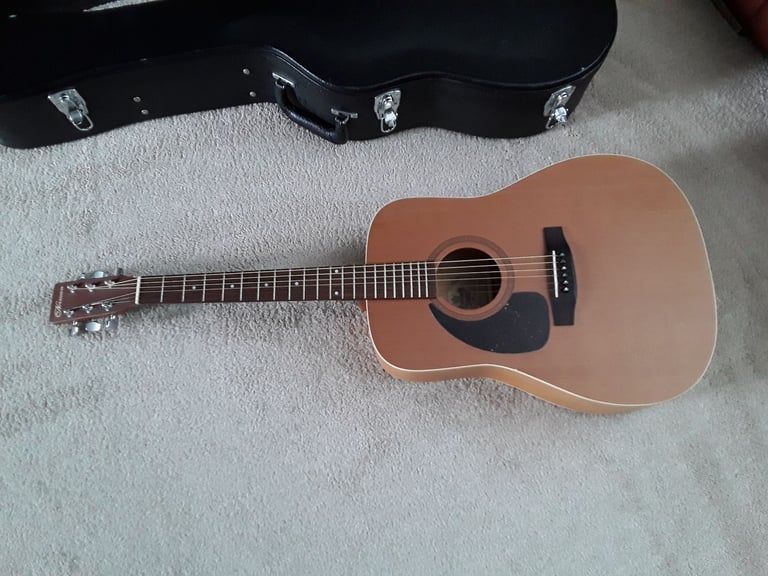 Left handed Norman B18 acoustic guitar, made in canada.