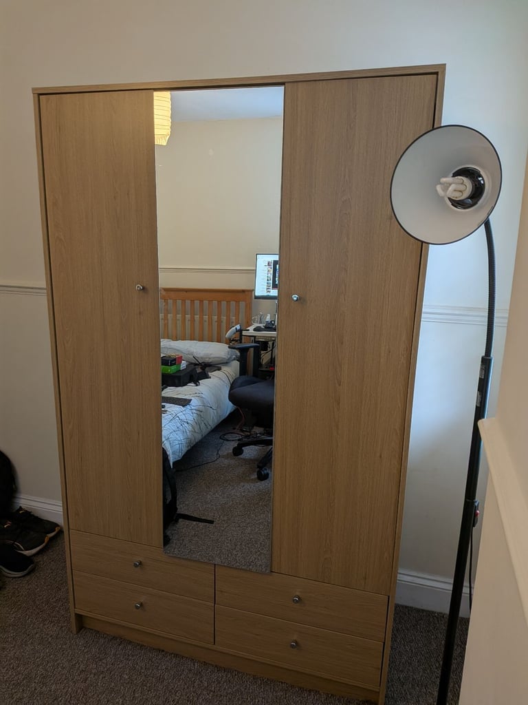 Freestanding wardrobe with mirror