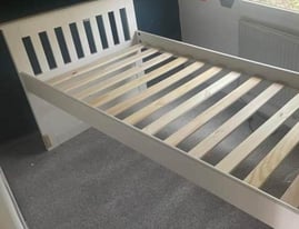 white wooden single bed , can deliver
