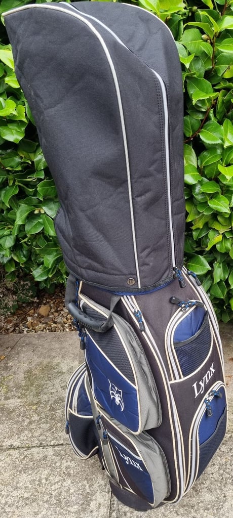 TAYLOR MADE, CALLAWAY, TITLEIST - NEW LYNX trolley bag, NEW CALLAWAY shoes & NEW SRIXON balls