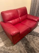 Red leather two seater setee 