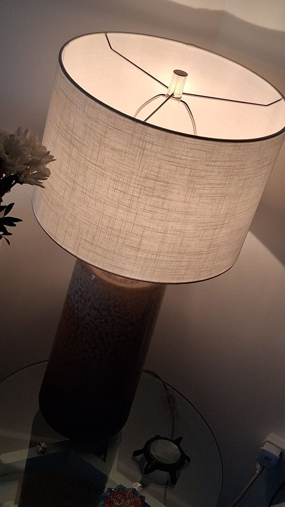 Quality lamp with white shade and 2 cream golden shades.  Almost new