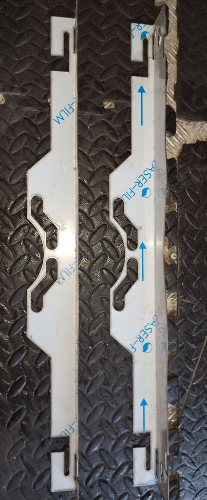 Vehicle wheel alignment brackets adjust toe in toe out and two tape measures