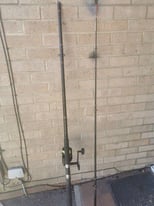 10ft Shakespeare fishing spinning rod and reel with rod rest