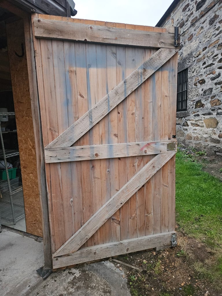 Double wooden Garage doors. 