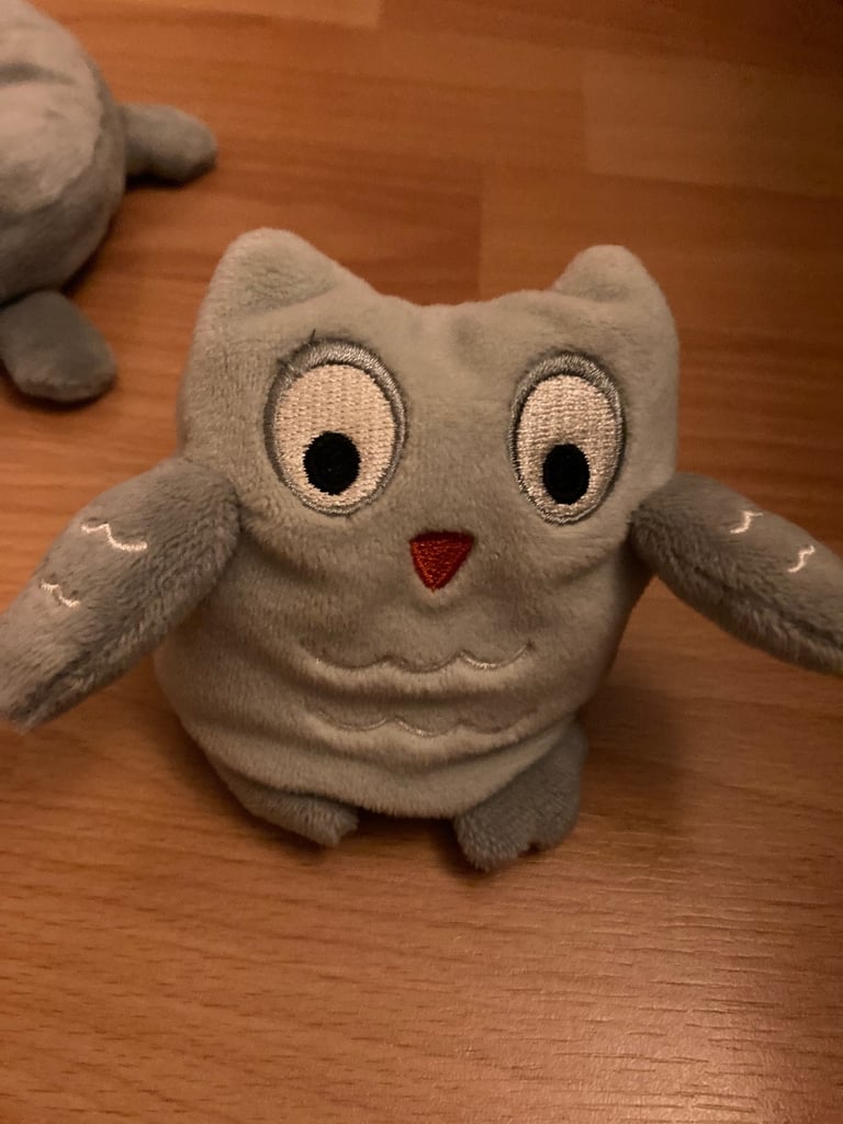 Selection of soft toys inc Peter rabbit bunny, giraffe, Winnie the Pooh and animal stacking ring