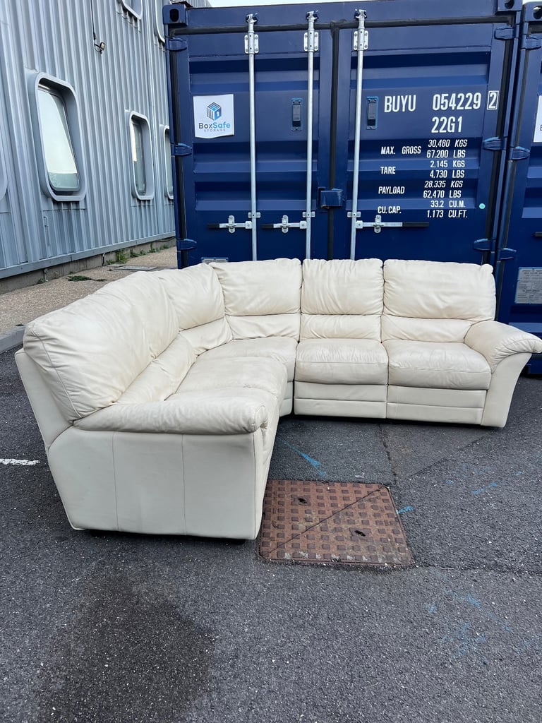 Cream leather corner sofa with recliner 