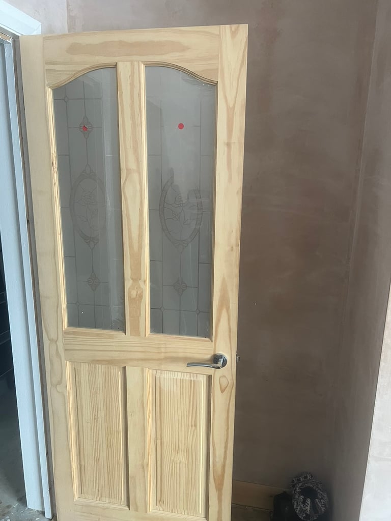 Pine Rio glazed door. Been hung. In perfect con with handle & Hinges.