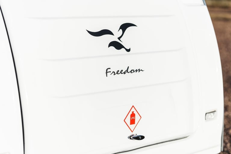 Freedom Wayfarer Quad - Small family caravan for four with bathroom
