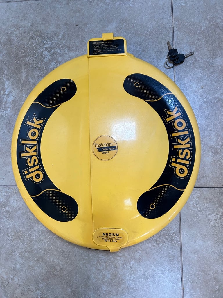 Disklok steering wheel vehicle security