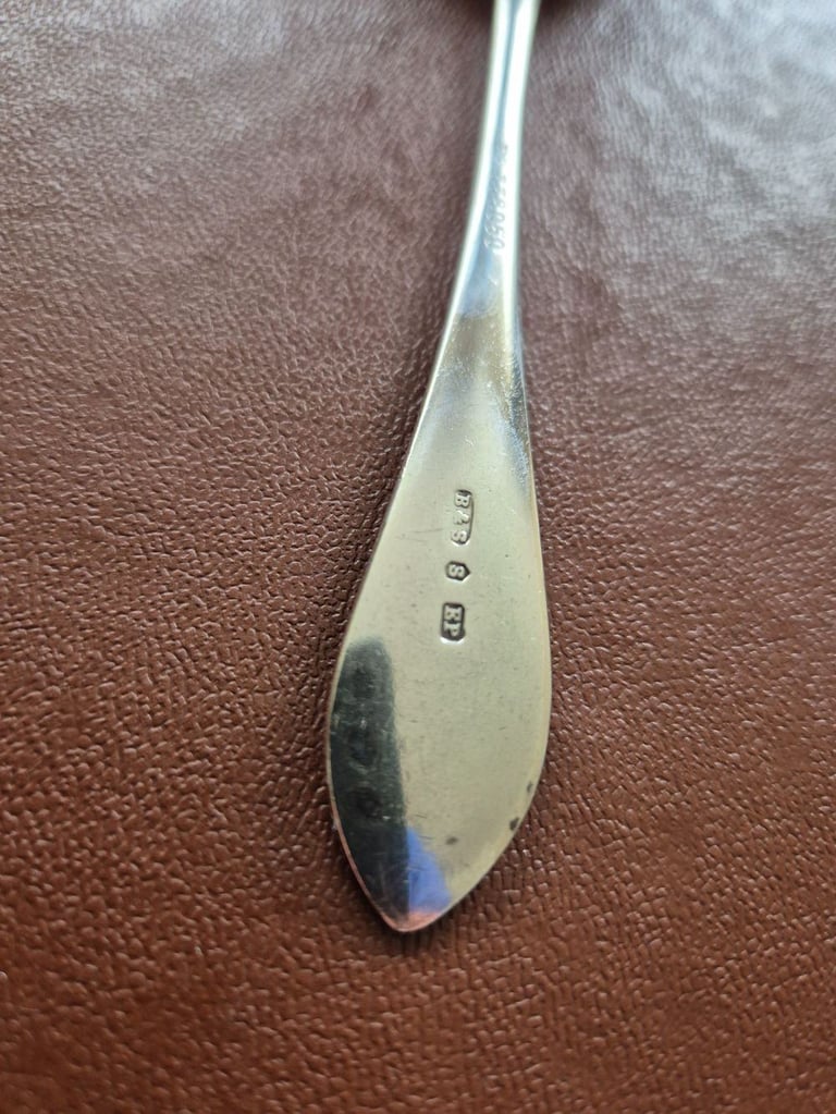 Vintage rare patterned spoon with RD 338050 B & S S BP markings on the back