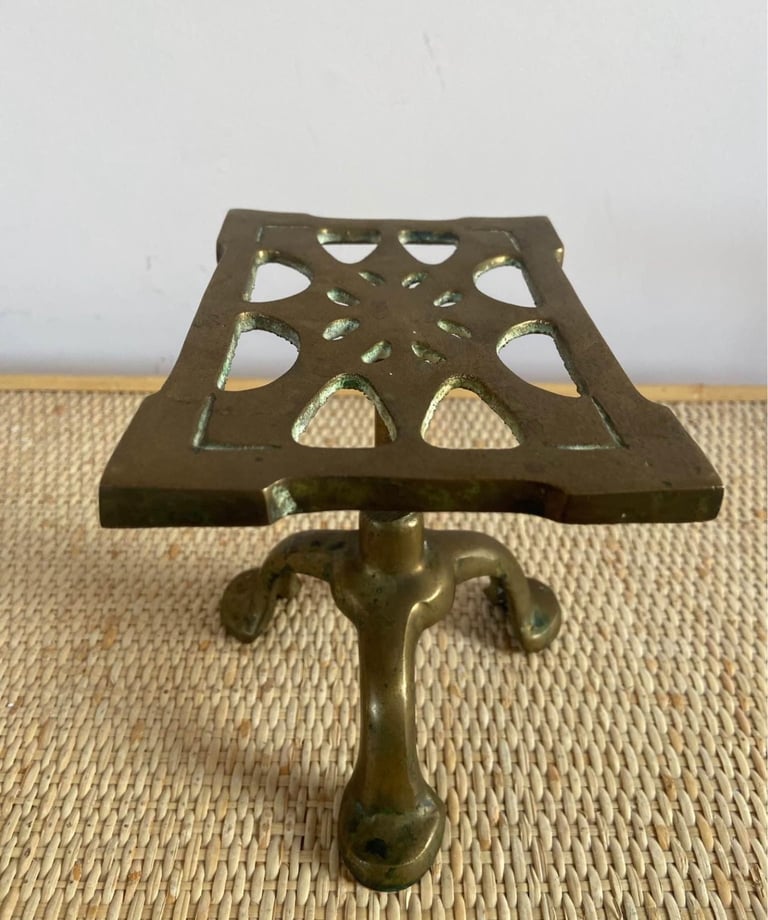 Antique, solid brass Fireside trivet 