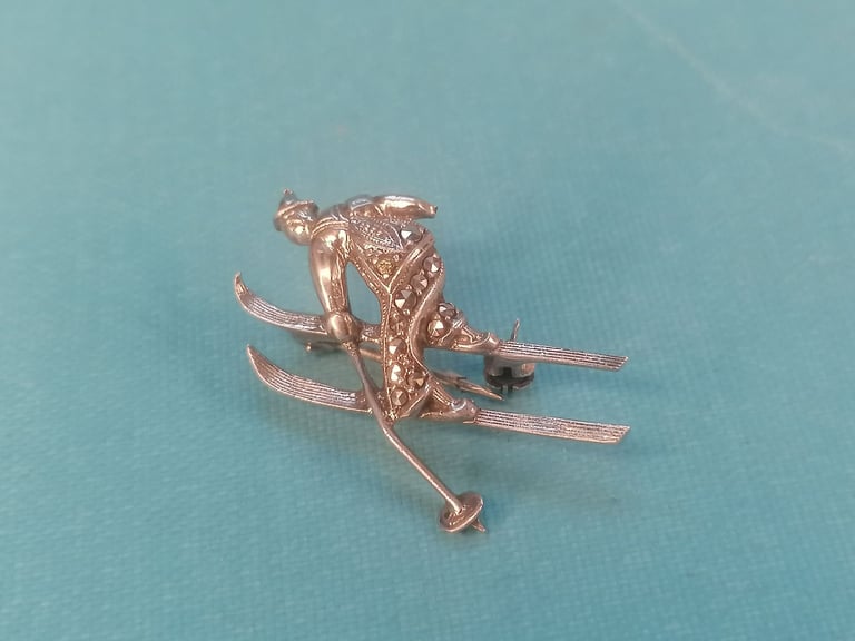 VINTAGE Brooch. Skier in mid - jump. 800  silver brooch. (missing one part as seen).