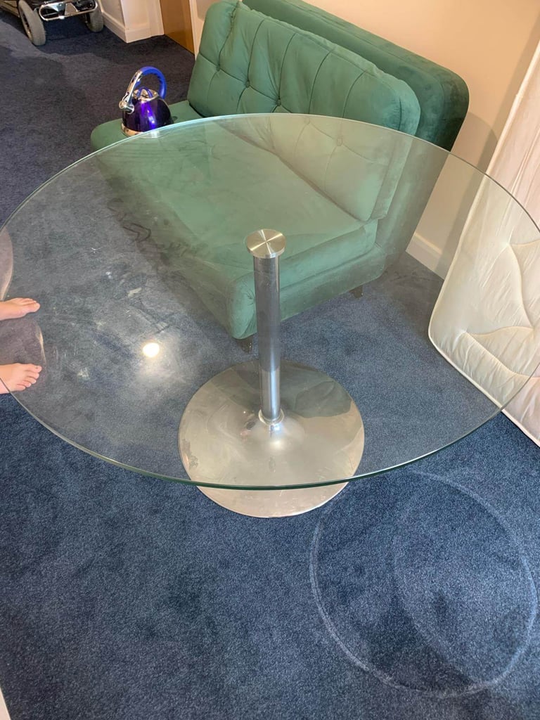 Glass top dining table