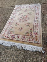 100% pure wool rug in good condition. Can deliver free