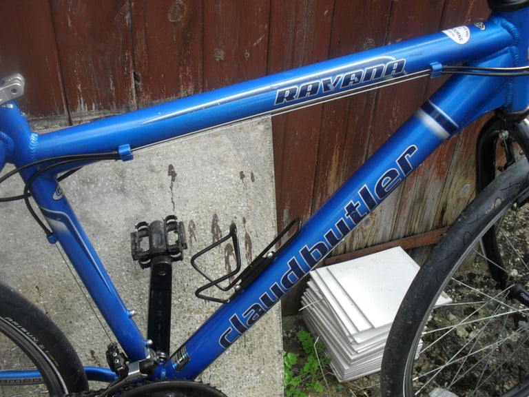 CLAUD BUTLER ADULT HYBRID BIKE.