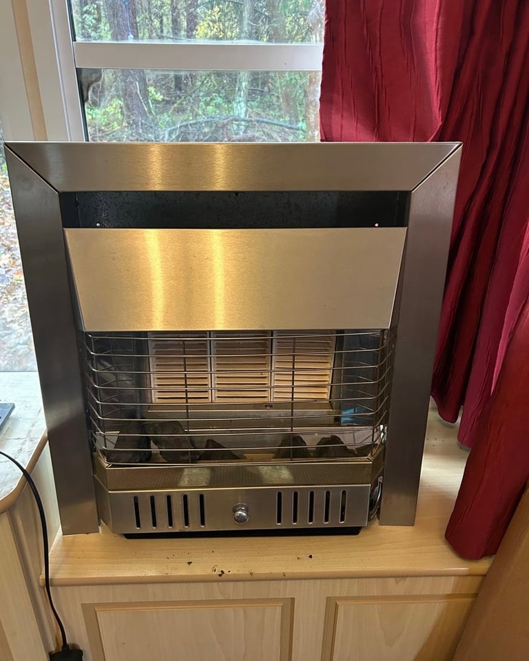 Gas fire. Perfect working order. 