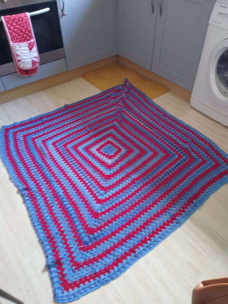 Hand crocheted and hand knitted blankets.