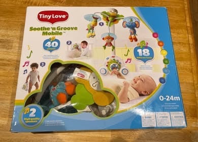 Baby rocker chair and mobile, plus changing mat