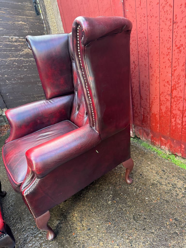 Chesterfield Leather wingback armchair and matching footstool