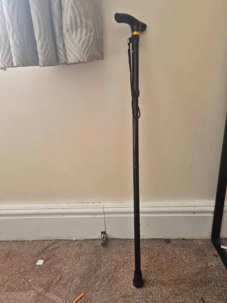 Walking Stick, adjustable. Folding. New
