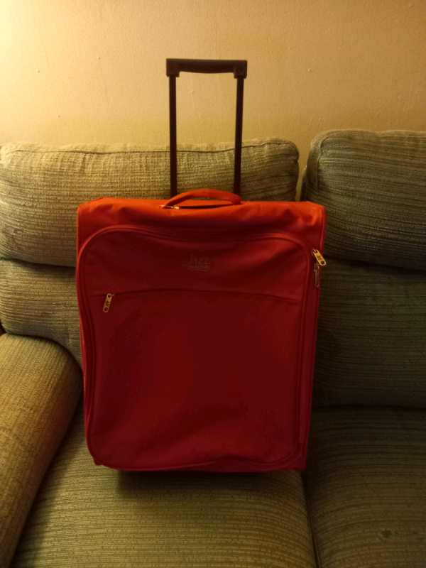 Small orange pink jazz suitcase 