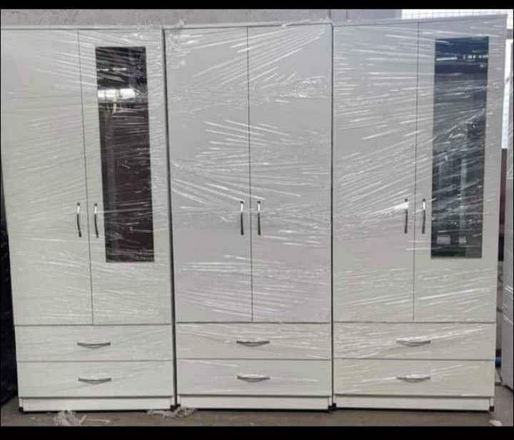 Modern Bedroom Furniture. Bedroom Suit Includes Bedside Tables, Chest of Drawers and Wardrobes