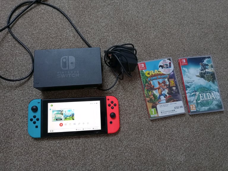 Nintendo switch 32gb neon blue with 2 games