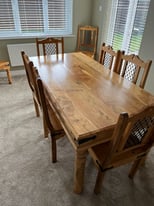 Solid hardwood dining table and 8 chairs