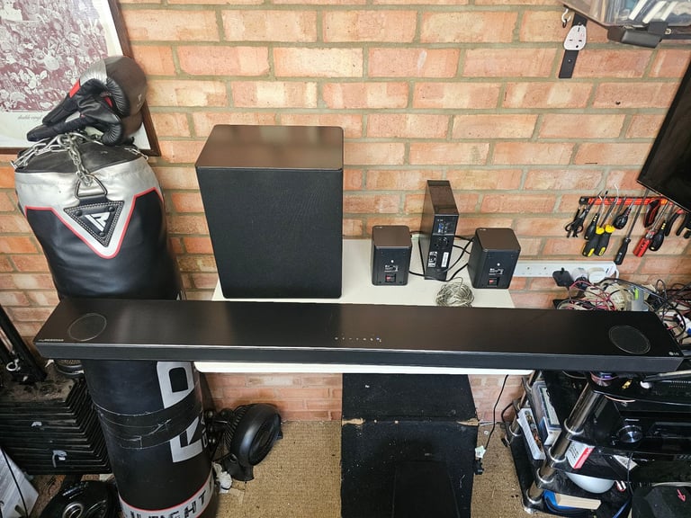 LG SL10YG Dolby Atmos & DTS:X 5.1.2 Soundbar + Wireless Subwoofer & Rear Speakers
